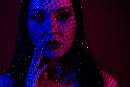 Photo of stunning gorgeous hot lady feel passion flirt isolated on dark red color backgroundの写真素材