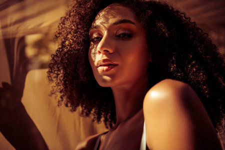 Close up cropped photo of charming gorgeous model girl enjoy herself sunny weather evening outdoorsの写真素材