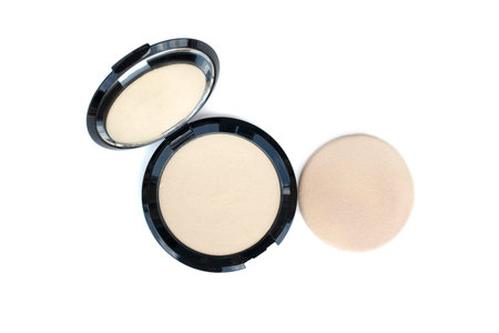 isolated top view makeup pressed powder and puff