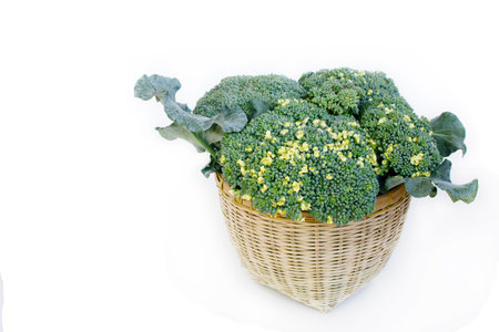 isoleted top view clean food and health organic green vegetables ,beautiful fresh Broccoli on handmade bamboo basketの写真素材