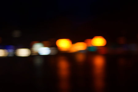Night city lights blur. Retro toned photo, vintage