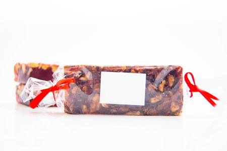 Orange fruit chewy candy on a white background. Jelly Bean