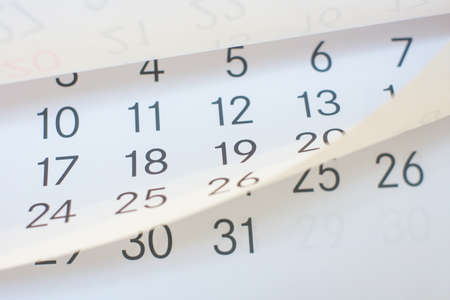 Close up a blue toned calendar pageの写真素材