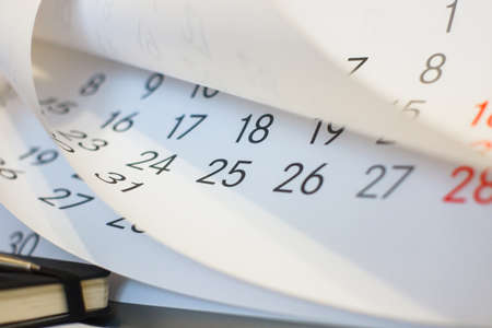 Close up a blue toned calendar pageの写真素材