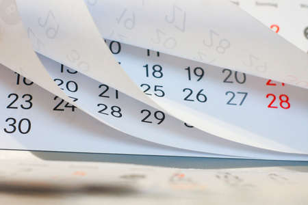 Close up a blue toned calendar pageの写真素材