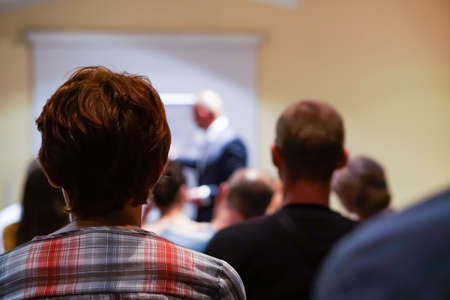 Businessman giving a presentation on flipchart. Teamwork conceptの写真素材