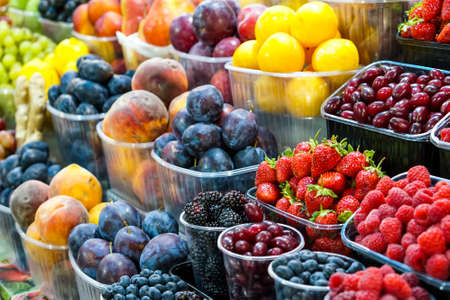 Berries and preserves at outdoor farmers marketの写真素材