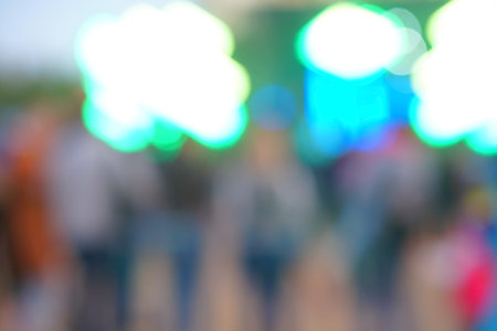Defocused entertainment concert lighting on stage, blurred disco party.