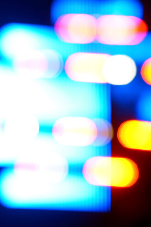 Defocused entertainment concert lighting on stage, blurred disco party.