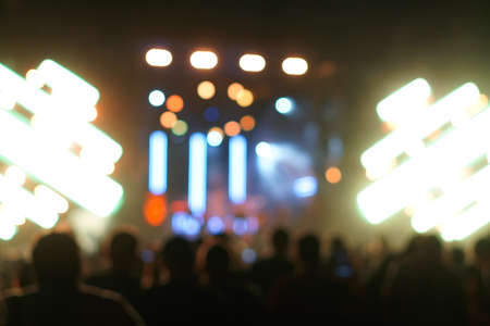Defocused entertainment concert lighting on stage, blurred disco party.の写真素材
