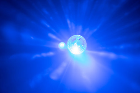 Lens flare effect. Different colors Abstract background.
