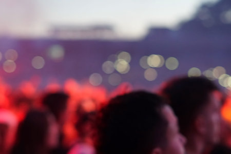concert background, hand up , blurry background, beautiful bokeh live concert