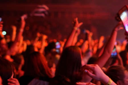 concert background, hand up , blurry background, beautiful bokeh live concertの写真素材