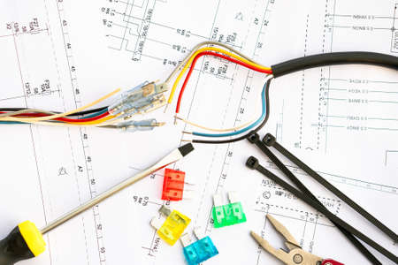 on the electric circuit there are tools, and safety locks of collars and wires.の写真素材