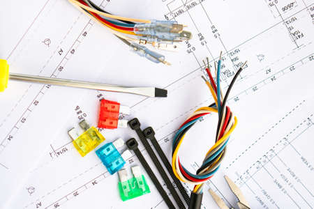 on the electric circuit there are tools, and safety locks of collars and wires.の写真素材