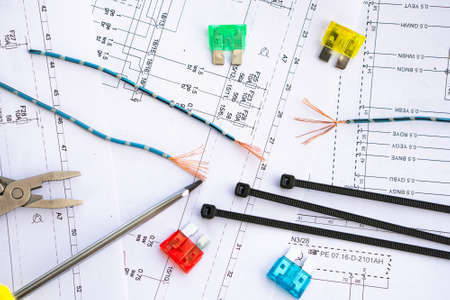 on the electric circuit there are tools, and safety locks of collars and wires.の写真素材