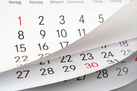 Close up a blue toned calendar pageの写真素材