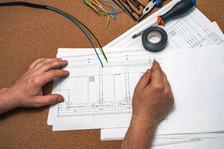 work electricity on electrical paper circuitの写真素材