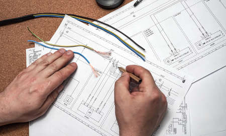 work electricity on electrical paper circuitの写真素材