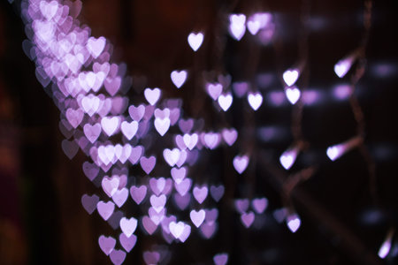 Valentine's day background. Heart bokeh background, Blurred background. Night city lights...
