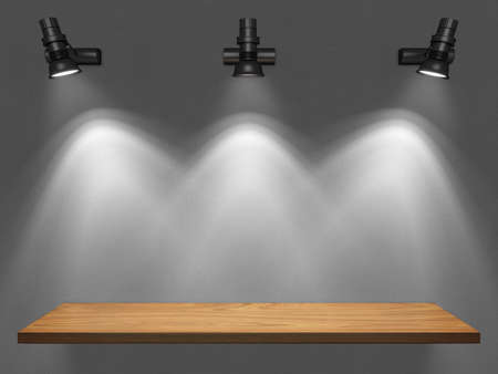 Empty shelf illuminated by spotlightsの写真素材