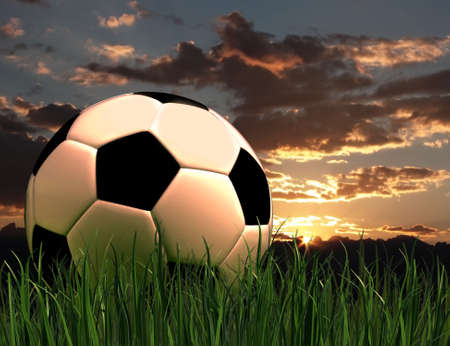 Very high resolution rendering of a soccer ball on the grassの写真素材
