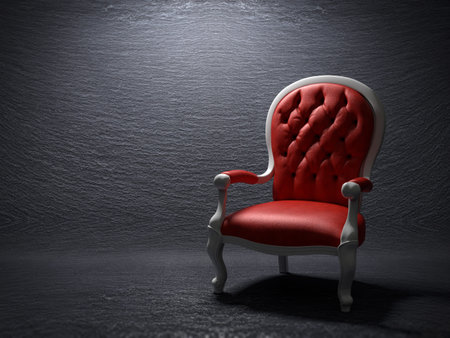 Red armchair on a slate stone backgroundの写真素材