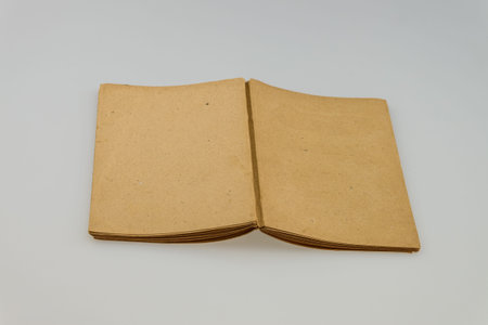 Old book open isolated on white background