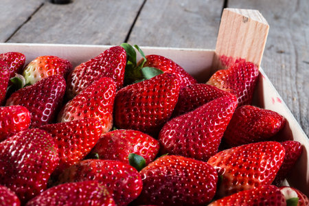 strawberry  on old wooden backgroundの写真素材