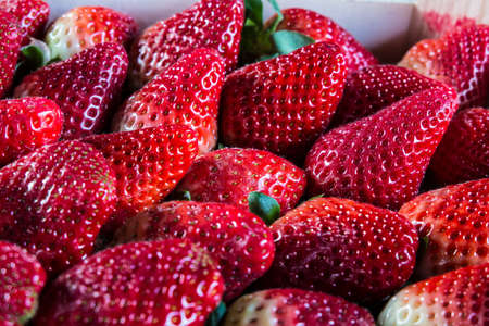 strawberry  on old wooden backgroundの写真素材