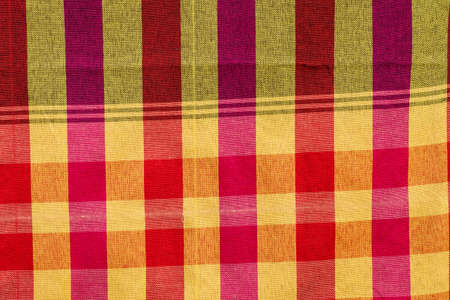 Fabric background cells of red,orange and yellowの写真素材