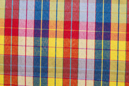 Fabric background cells of white,blue,yellow and redの写真素材