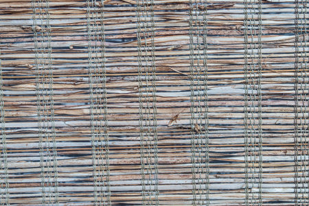 Bamboo placemat straw wood texture for the backgroundの写真素材