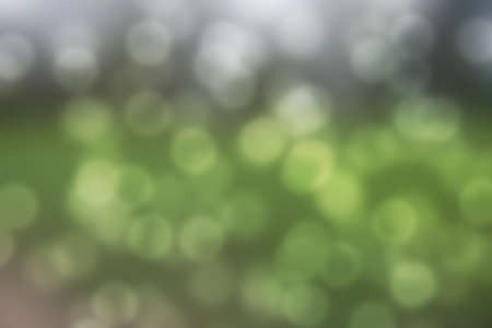 Abstract circular green bokeh backgroundの写真素材