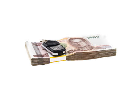 Thailand money banknotes stacked isolated  with electrical car  remoteの写真素材