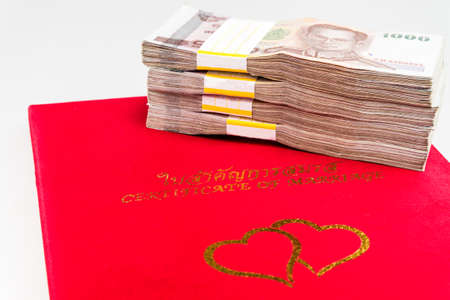 Thailand money banknotes stacked isolated with  marriage Registration coverの写真素材