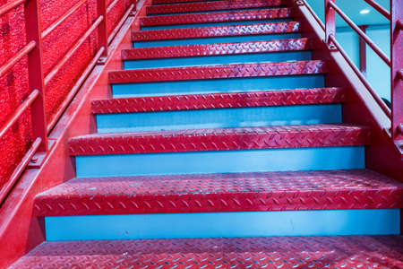 Red metal stair.の写真素材