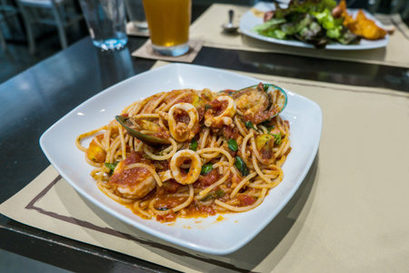 Spaghetti with seafood in red sauceの写真素材