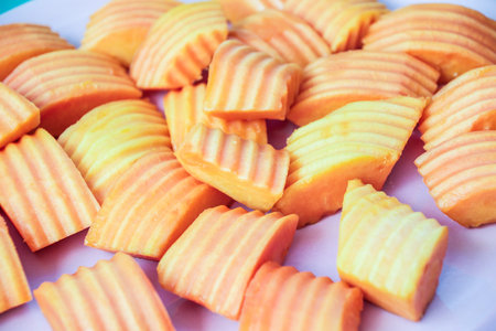 rip papaya sliced in plate
