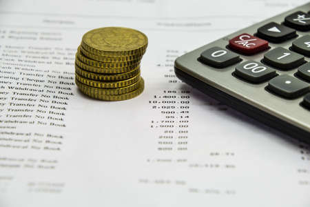 Bank statement and Euro coinの写真素材