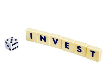 Financial concept,scrable  invest text with diceの写真素材