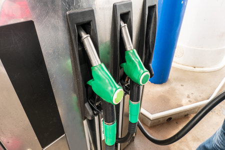 Petrol pump filling in gas station