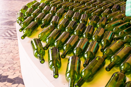 Green bottle arrange in the row.