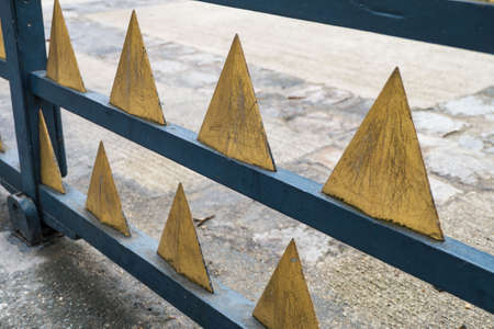 Gold triangle metal fence.の写真素材