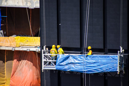 Worker working for LED panel.