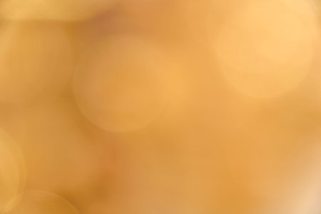 gold bokeh abstract background defocused lights.の写真素材