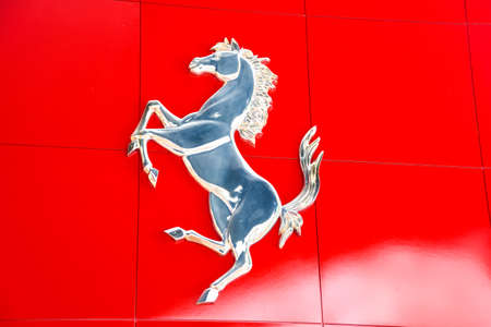 ABU DHABI, UAE - November 7,2015: Logo of a Ferrari car at Ferrari World at Yas Island in Abu Dhabi.Ferrari World is the largest indoor amusement park in the world.のeditorial素材