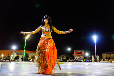 Dubai, United Arab Emirates -November 6, 2015: beautiful belly dancer performing a "Belly Dance".のeditorial素材