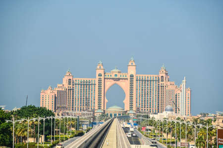 Dubai, United Arab Emirates -November 5, 2015:Atlantis hotel and monorail train on a man-made island Palm Jumeirah  in Dubai, UAE. This monorail is the longest completely automated rail system.のeditorial素材