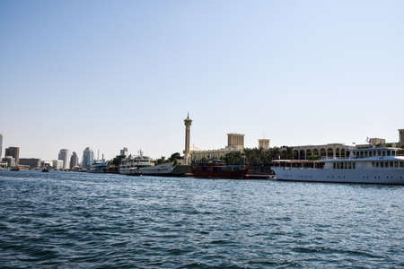 Dubai, United Arab Emirates -November 6, 2015:People on traditional abra ferries on November 6,2015 in Dubai, UAE. Shipbuilding technology is unchanged from the 18th century.のeditorial素材